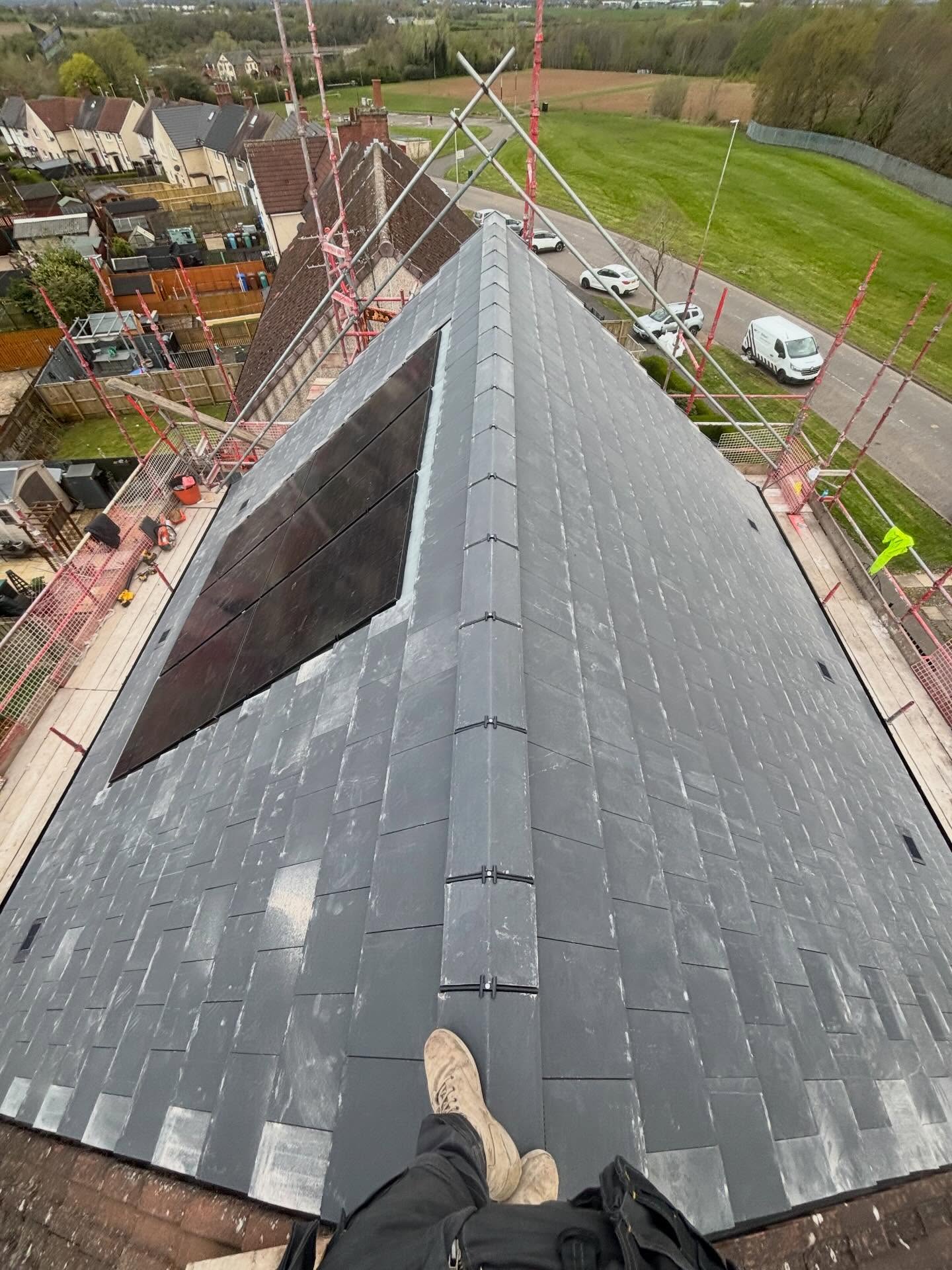 New slate roof with integrated solar panels